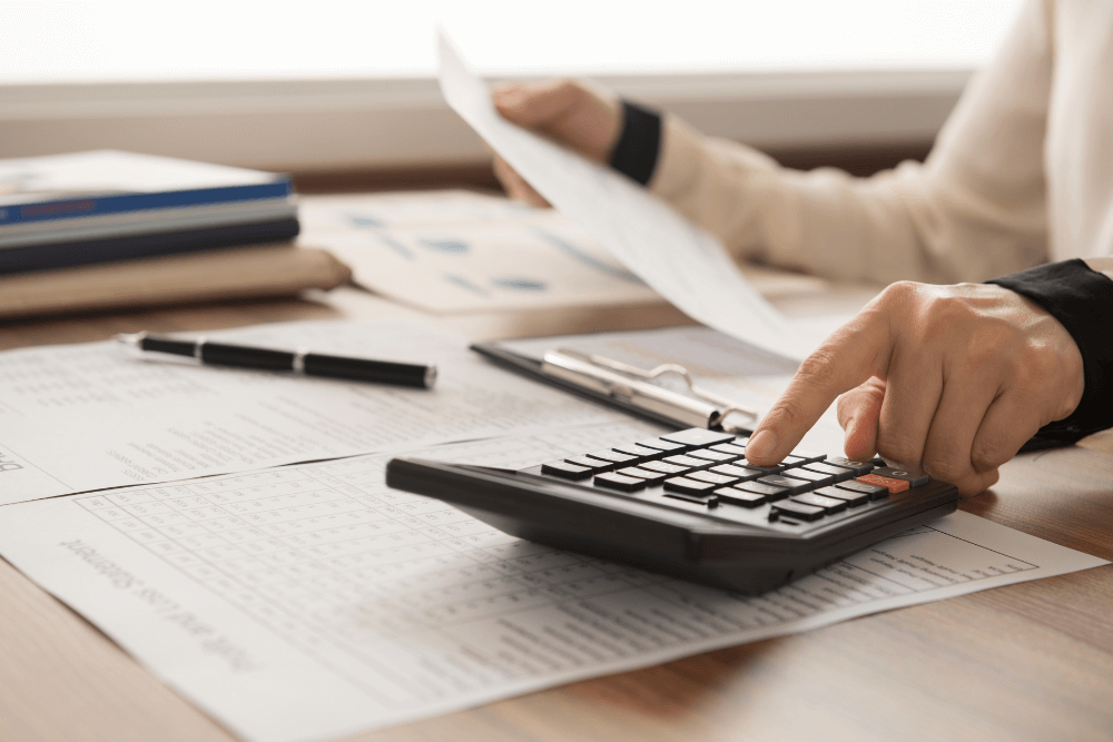 Accountant using calculator